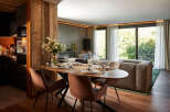 Experience luxury living in this stunning property, featuring a beautifully designed dining area perfect for entertaining.