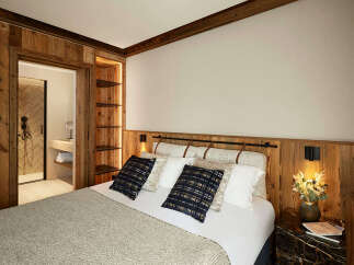Experience luxury and comfort in this beautifully designed bedroom.