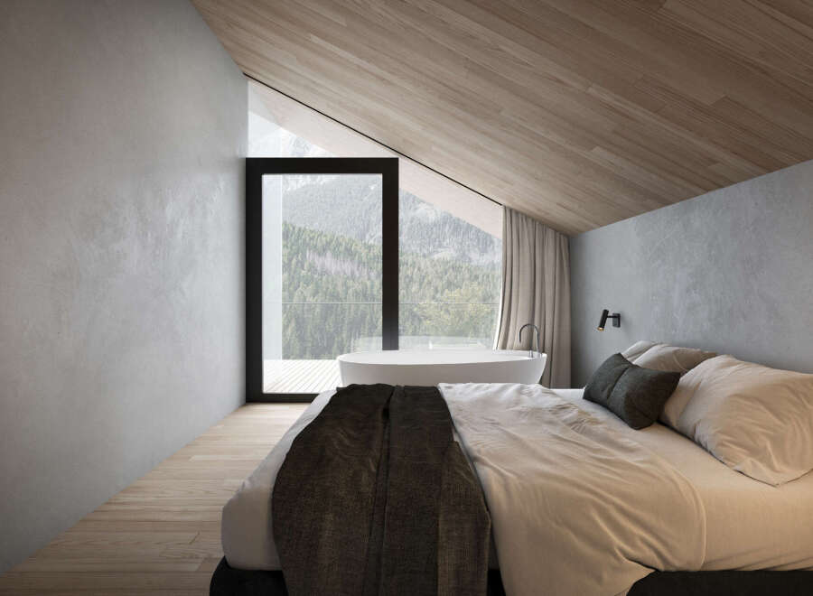 Experience luxury living in this stunning bedroom with breathtaking mountain views.