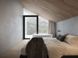 Experience luxury living in this stunning bedroom with breathtaking mountain views.