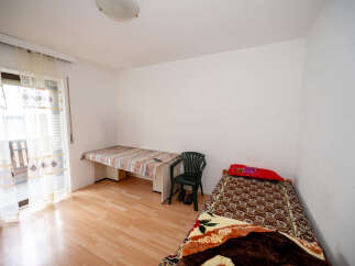 Discover a cozy and inviting bedroom space, perfect for relaxation.