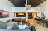 Experience luxury living in this stunning property, featuring a spacious open-concept design.