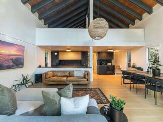 Experience luxury living in this stunning property, featuring a spacious open-concept design.