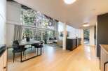 Experience the epitome of modern living in this stunning property, boasting an open-concept design that seamlessly blends indoor and outdoor spaces.