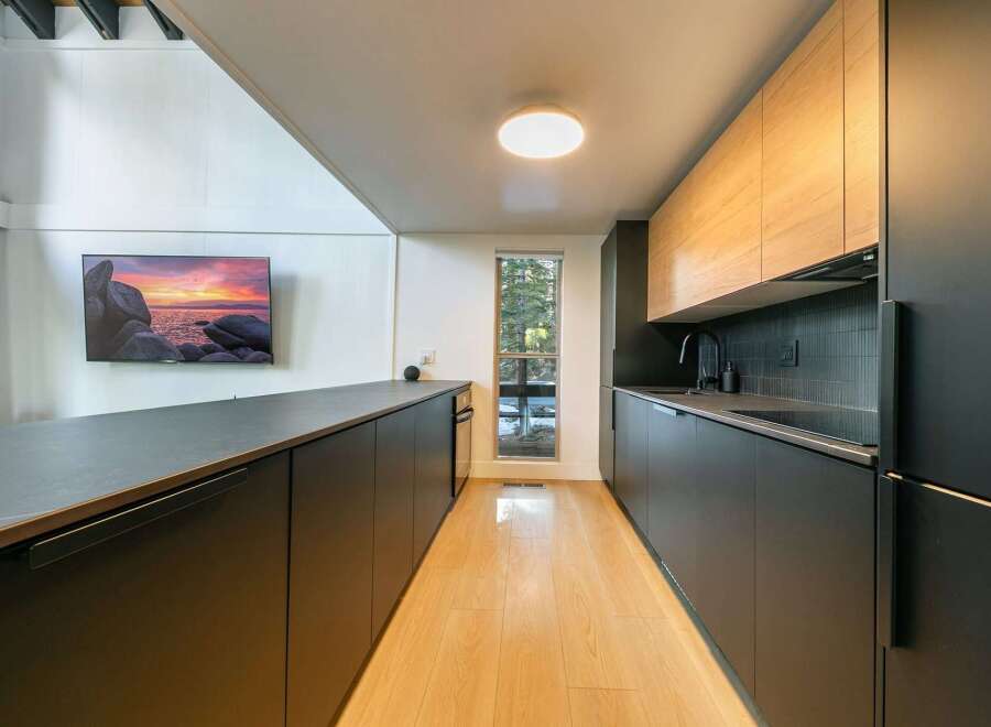 Step into modern elegance with this stunning kitchen.