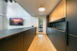 Step into modern elegance with this stunning kitchen.