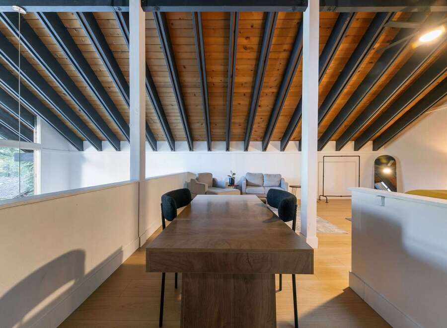 Discover the charm of this stunning property, featuring a beautifully designed interior with exposed wooden beams and a modern aesthetic.