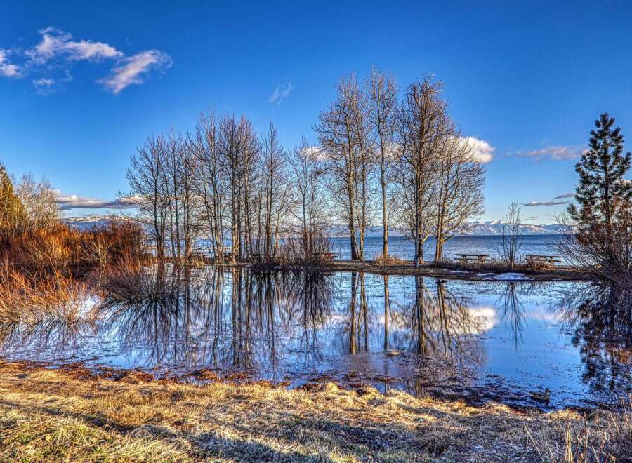 Discover the tranquility of lakeside living with this stunning property.