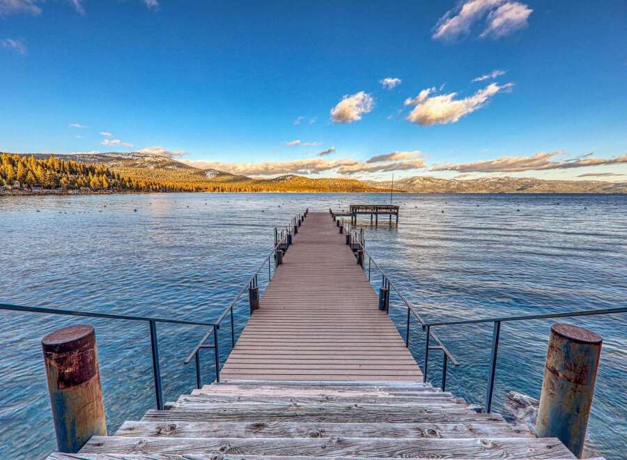 Experience serene waterfront living with this stunning property.