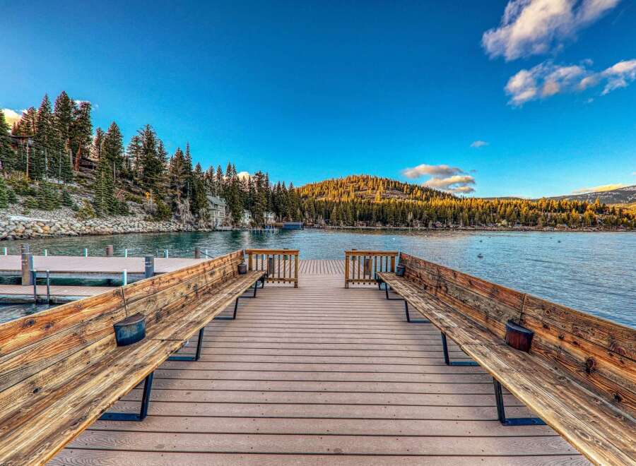 Enjoy breathtaking lake views from this stunning property! This home features a private dock, perfect for boating and fishing.
