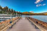 Enjoy breathtaking lake views from this stunning property! This home features a private dock, perfect for boating and fishing.