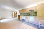 Discover this stunning property featuring a modern kitchen with sleek cabinetry and a stylish backsplash.