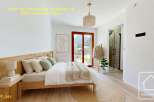 Discover the charm of this beautifully staged bedroom, perfect for a relaxing retreat.