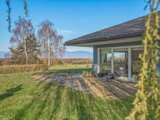 Enjoy the tranquility of this stunning property, featuring a beautifully designed patio perfect for outdoor relaxation.