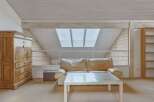 This stunning property boasts a unique architectural design with a bright and airy living space.