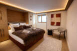 Experience luxury and comfort in this stunning bedroom.