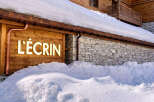 Discover the charm of this stunning property, nestled in a snowy landscape.
