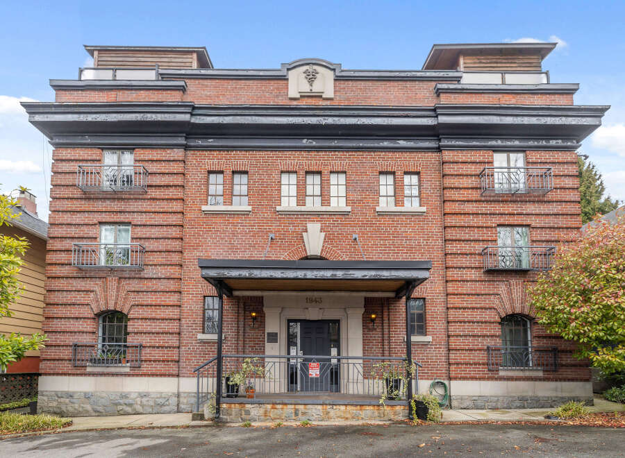 This stunning brick building offers a unique blend of classic architecture and modern living.