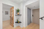 Step into this inviting entryway, showcasing a blend of modern design and natural elements.
