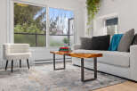 Step into a bright and airy living space, perfect for relaxation and entertaining.