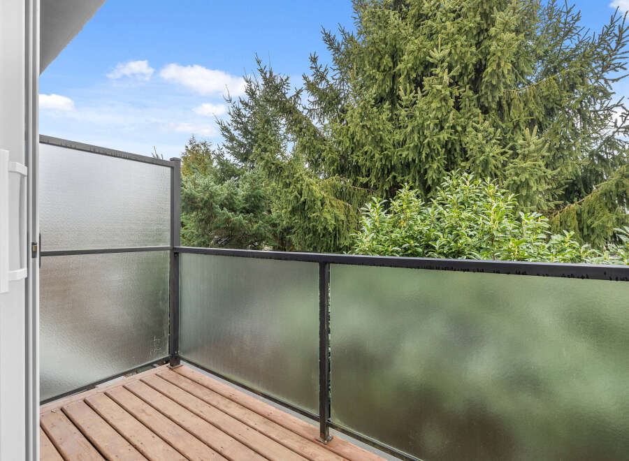 Enjoy the tranquility of this private balcony, perfect for morning coffee or evening relaxation.
