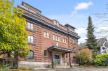 This stunning brick building offers a unique blend of classic architecture and modern living.
