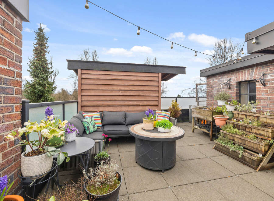 Enjoy outdoor living at its finest on this stunning rooftop patio.