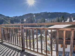 Enjoy breathtaking mountain views from this charming property.