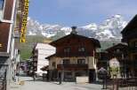 Discover the charm of this mountain town, featuring stunning views of snow-capped peaks and traditional architecture.