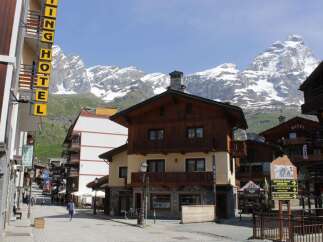 Discover the charm of this mountain town, featuring stunning views of snow-capped peaks and traditional architecture.