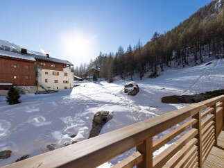 Experience the charm of this stunning mountain property, nestled in a picturesque winter wonderland.