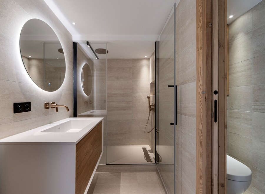 Step into modern luxury with this stunning bathroom design.