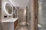 Step into modern luxury with this stunning bathroom design.