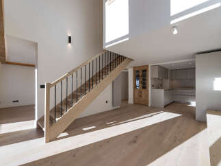 This stunning property boasts a modern interior with a bright and airy feel, perfect for comfortable living.