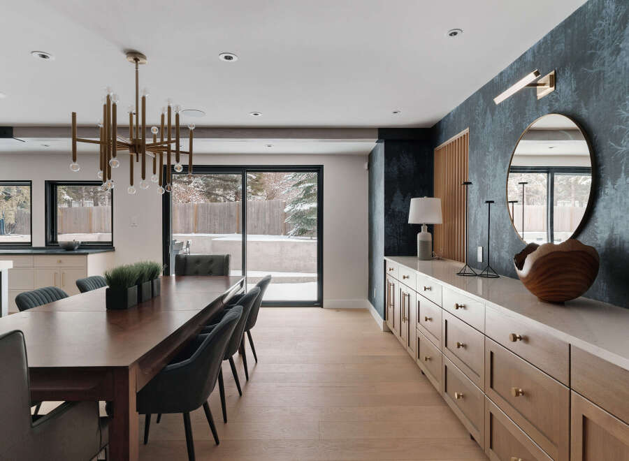 This stunning dining room showcases a modern design with elegant touches.