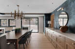 This stunning dining room showcases a modern design with elegant touches.