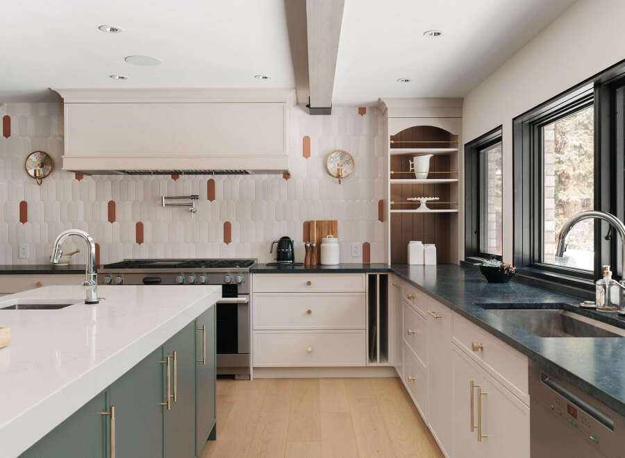 This stunning kitchen boasts a modern design with high-end finishes.
