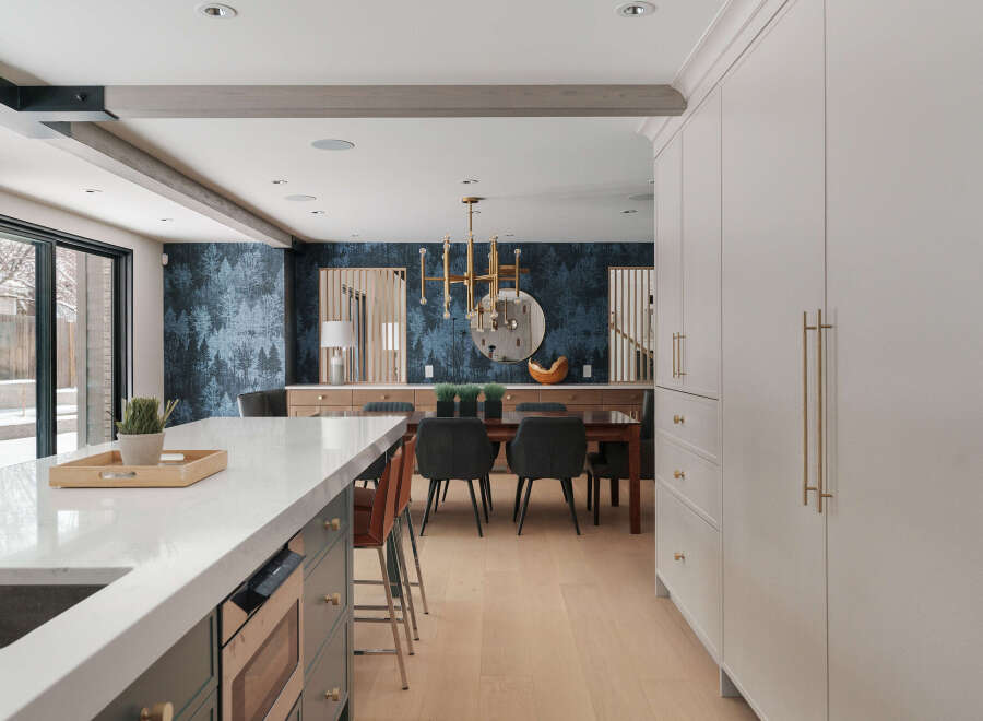 Step into luxury with this stunning modern home! The open-concept kitchen boasts a sleek countertop, perfect for entertaining.