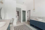 Step into luxury with this stunning bathroom, featuring a sleek design and high-end finishes.