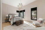Step into a serene bedroom retreat, where elegance meets comfort.