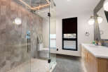 Step into luxury with this stunning bathroom! Featuring a modern glass shower, elegant tile work, and stylish lighting, this space is designed for relaxation.
