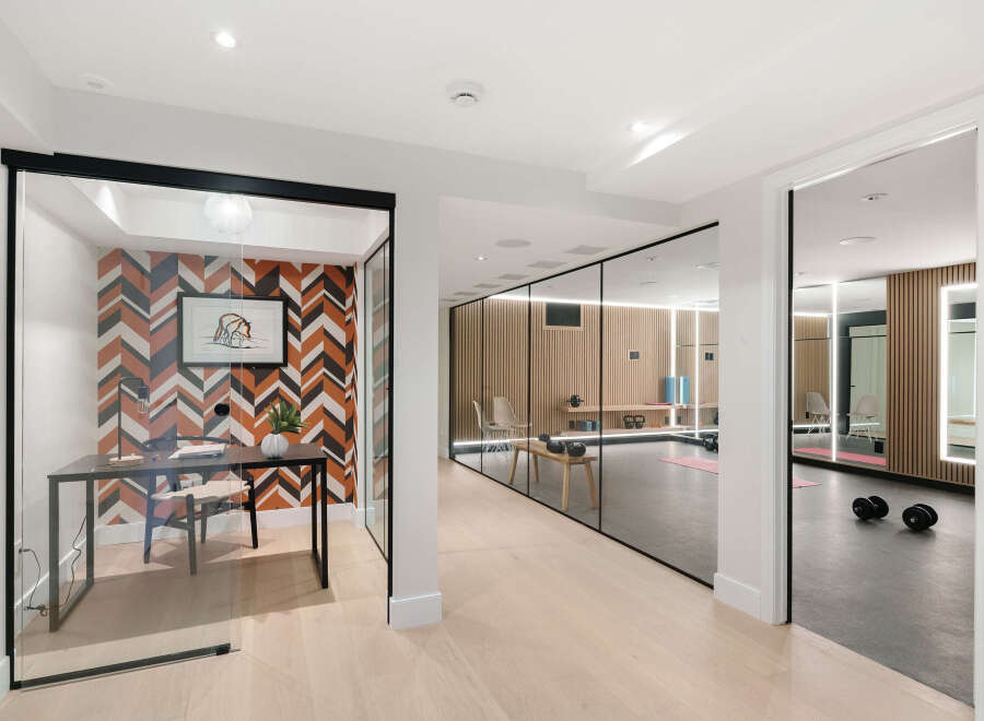 Step into luxury with this stunning property featuring a modern home office and a state-of-the-art home gym.