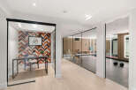 Step into luxury with this stunning property featuring a modern home office and a state-of-the-art home gym.