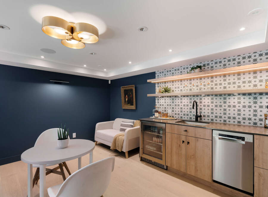 This stunning property boasts a beautifully designed bar area, perfect for entertaining guests.