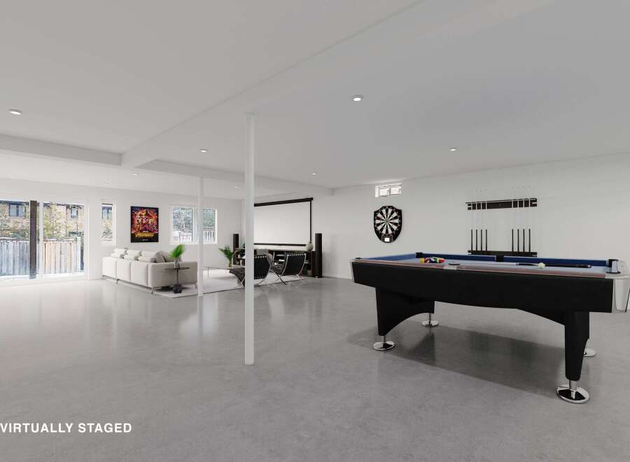 This stunning property boasts a spacious game room, perfect for entertaining and relaxation.