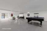 This stunning property boasts a spacious game room, perfect for entertaining and relaxation.
