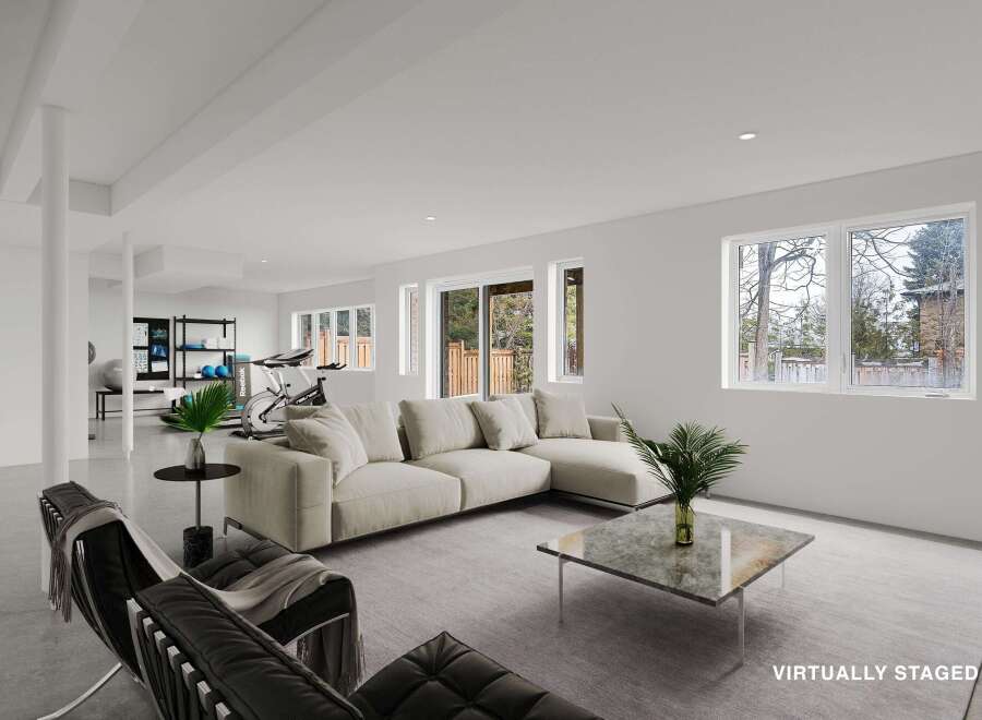 This stunning property boasts a modern, open-concept living space, perfect for entertaining or relaxing.
