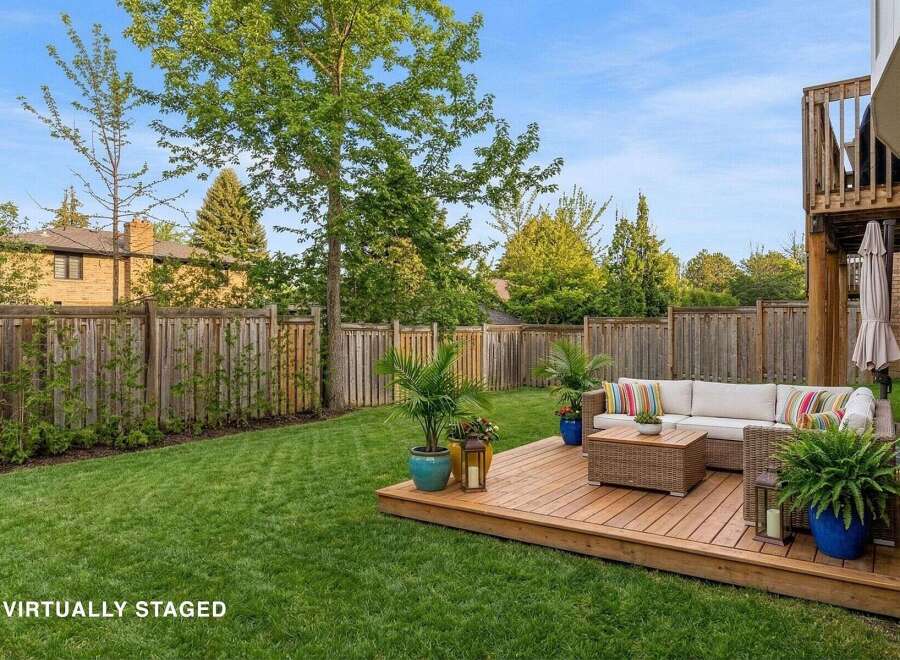 Enjoy outdoor living at its finest in this beautifully landscaped backyard.
