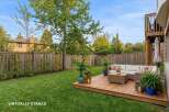 Enjoy outdoor living at its finest in this beautifully landscaped backyard.