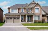This stunning two-story brick home offers a perfect blend of elegance and comfort.